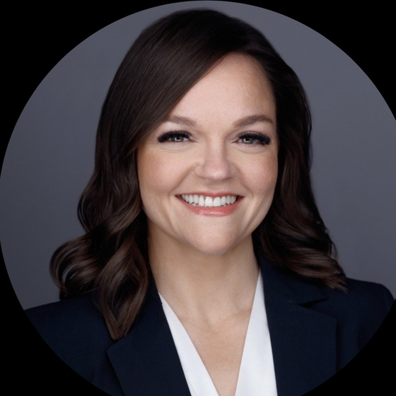 Professional headshot of Marci Wake.